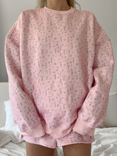 Soft Pink Floral Sweatshirt with Ditsy Blue Blooms for a Sweet and Cozy Look