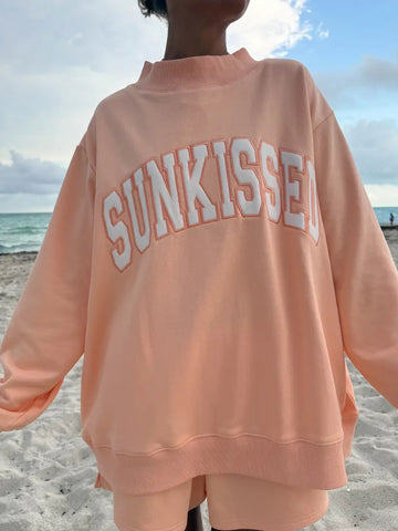 Vibrant Papaya Orange Embroidered Mockneck Sweatshirt for a Sunkissed Look