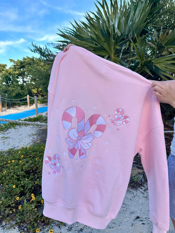 Cozy Light Pink Sweatshirt with Candy Cane Wonderland Print