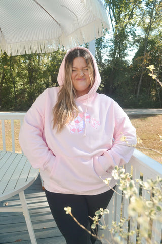 Cozy Pink Candy Cane Hoodie for Festive Street Style