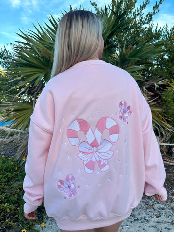 Cozy Light Pink Sweatshirt with Candy Cane Wonderland Print