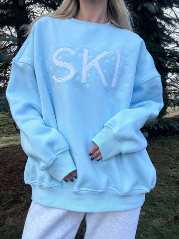 Cozy Icy Blue Snowflake Sweatshirt for Winter Adventures and Après-Ski Style