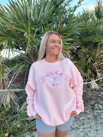 Cozy Light Pink Sweatshirt with Candy Cane Wonderland Print