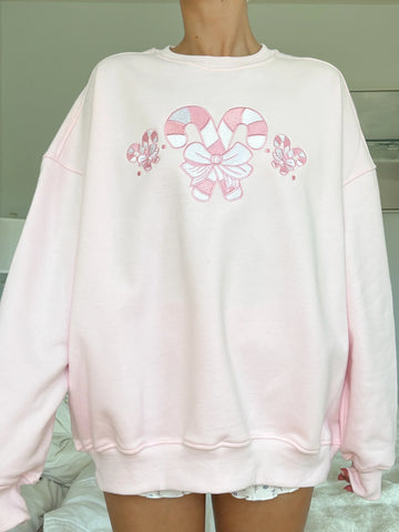 Cozy Light Pink Sweatshirt with Candy Cane Wonderland Print
