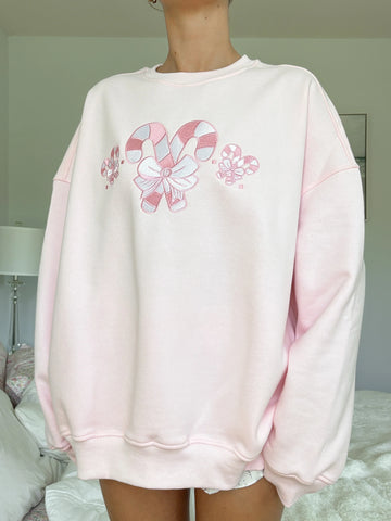 Cozy Light Pink Sweatshirt with Candy Cane Wonderland Print