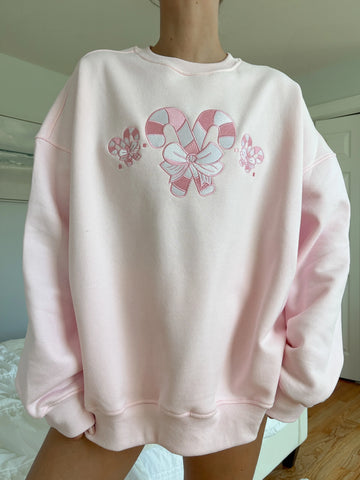 Cozy Light Pink Sweatshirt with Candy Cane Wonderland Print