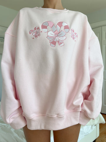 Cozy Light Pink Sweatshirt with Candy Cane Wonderland Print