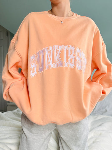 Varsity Embroidered Sweatshirt in Sherbet Orange for Effortless Street Style