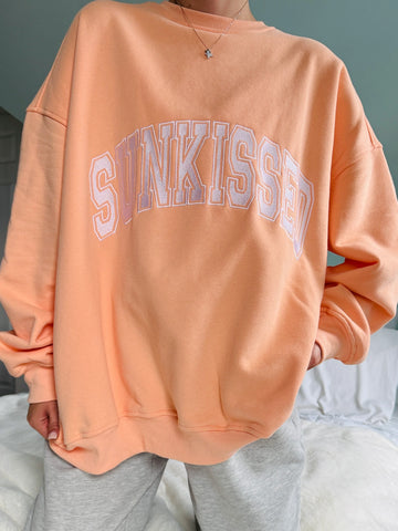 Varsity Embroidered Sweatshirt in Sherbet Orange for Effortless Street Style