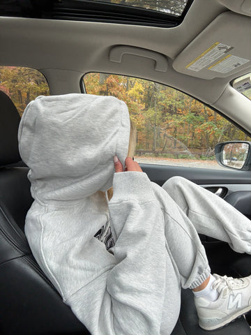 Oversized Grey Varsity Hoodie with Embroidered Sun Motif