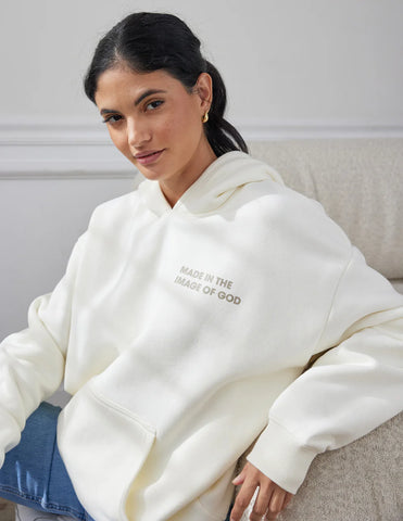 Cozy Cream Hoodie with Inspirational Bible Verse Genesis 1:27