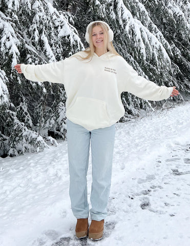 Cozy Cream Hoodie with Inspirational Bible Verse Genesis 1:27