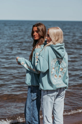 Ocean-Inspired Hoodie with Embroidered Shells for Coastal Style